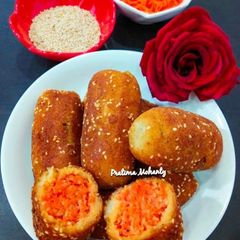 A picture of Carrot Stuffed Sesame Bread Roll.