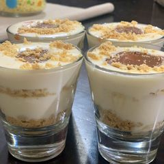 A picture of Caramel with cheese cake sauce dessert in a cup.