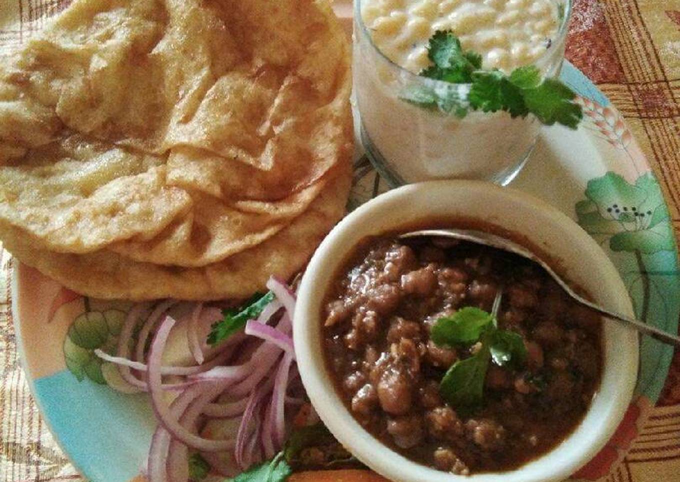 Panjabi chole bhature onion and Bundi ka Raita