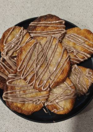 Foto principal de Pastas de nata bañadas en chocolate