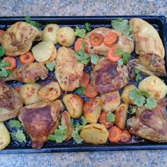 A picture of Grilled chicken & vegetables.