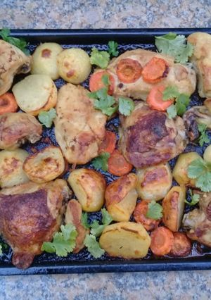 A picture of Grilled chicken & vegetables.