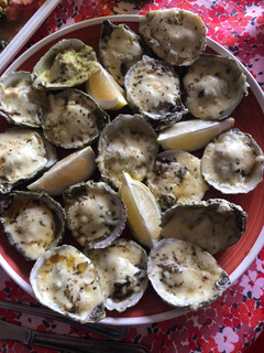 Una foto de Ostras a la parmesana