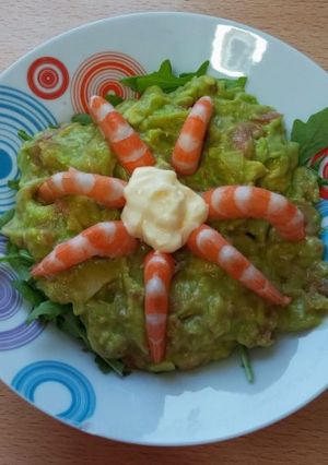 Una foto de Guacamole con langostinos