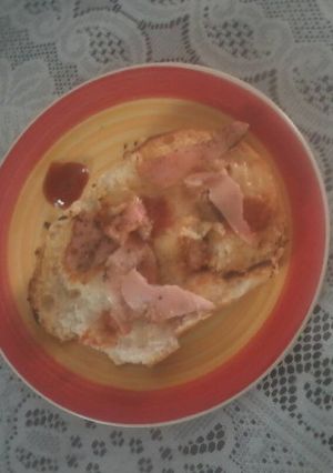 Una foto de Pizza en un pan