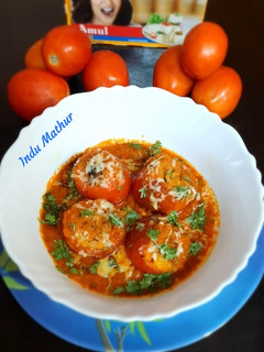स्टफ्ड चीज़ टमाटो विद ग्रेवी (stuffed cheese tomato with gravy recipe in hindi) रेसिपी मुख्य फोटो