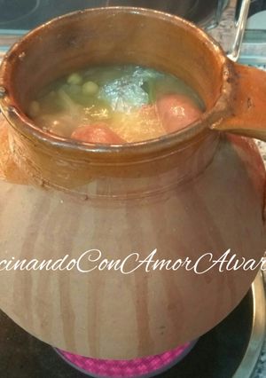 A picture of Cocido Madrileño in a Clay Pot.