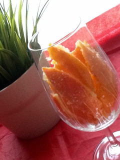 Una foto de Tiritas de naranja confitada