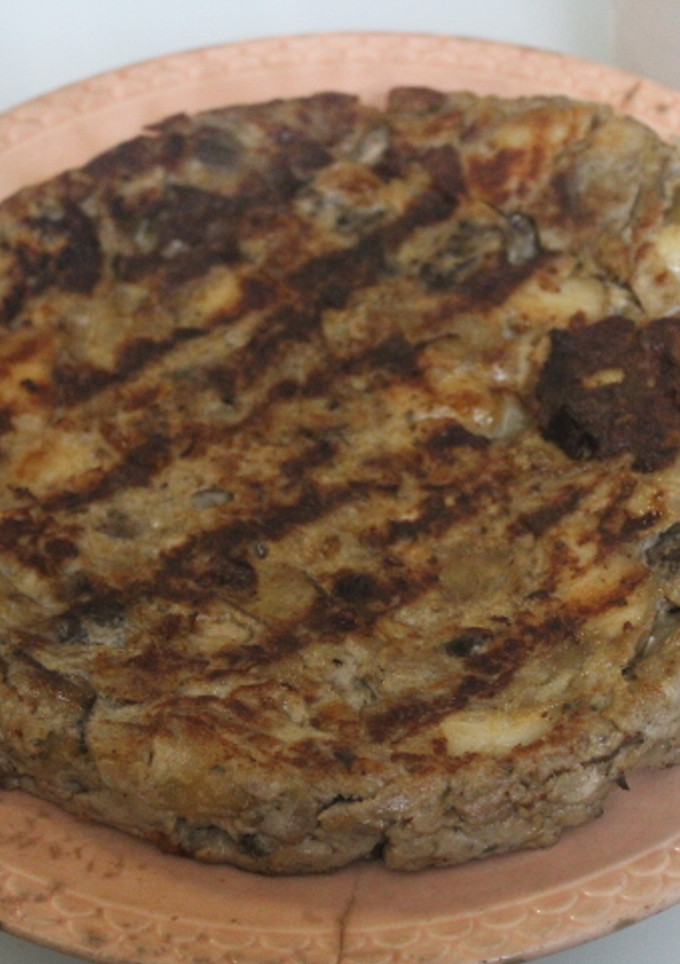 Una foto de Tortilla de alcachofas con cebolla