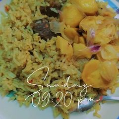 A picture of Senegal rice wit potatoe souce.