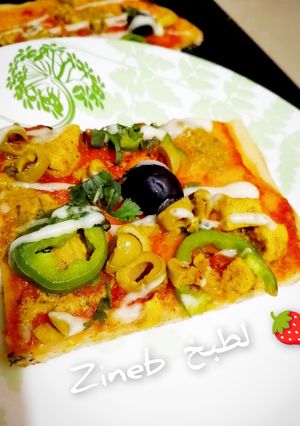 صورة لوصفة بيتزا الشاورما بصلصة الطماطم 🍅🍕