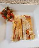 Tamales de pollo con mole rojo