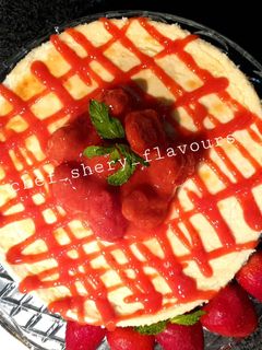 صورة لوصفة تشيز كيك مخبوز مع صلصة الفراولة المنزلية - Baked Cheesecake with homemade strawberry souce🍓