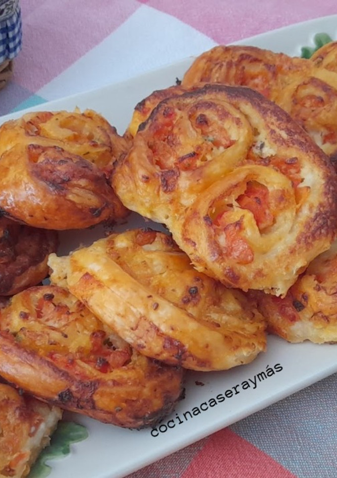 Una foto de Palmeritas de queso y tomate