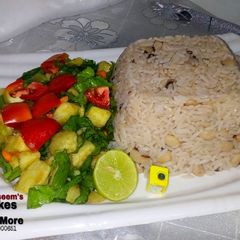 A picture of 2 pack / rice & bean's with sweet potato salad.