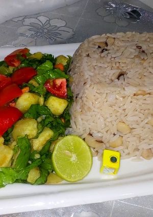 A picture of 2 pack / rice & bean's with sweet potato salad.