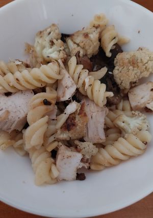 A picture of Sig's roast chicken, roast cauliflower, onion and mushroom pasta.