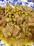 Paletilla de cordero recental con guisantes
