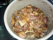 A picture of cá chép kho riềng