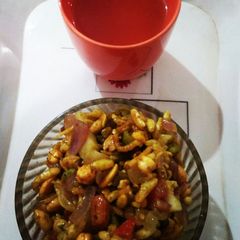 A picture of Jhal muri with Lemon Tea.