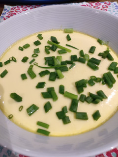 A picture of Steamed Egg with Crabstick and Spring Onion.