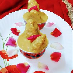 A picture of Aata dudh puli or coconut stuffed whole wheat rice dumpling.