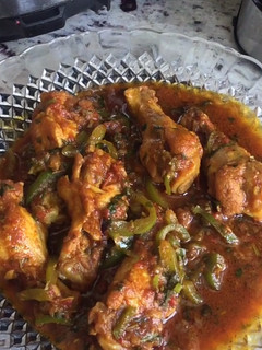 A picture of Chicken wings with green paper (shimla Mitch) iftar special.