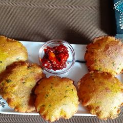 A picture of Bajra-Barley Aloo Puri (Pearl Millet).