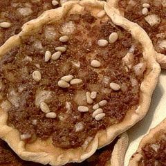 A picture of Sheik's traditional Syrian Meat Pies (Sfeeha).