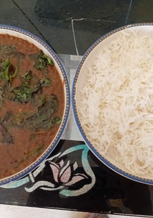 A picture of Sabut masoor daal with boiled rice.
