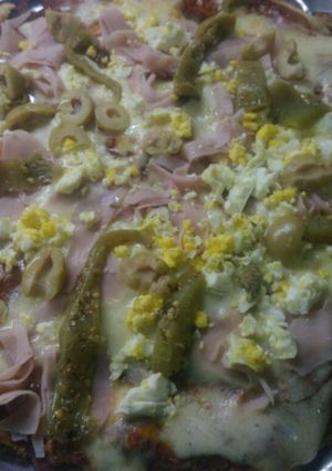 Una foto de Pizza de pan integral viejo🍕🍕