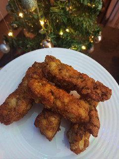 Una foto de Palitos crocantes de pollo