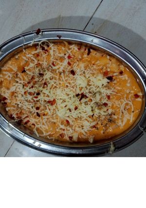 A picture of Macaroni in Red Sauce.