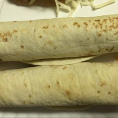 A picture of Creamy Baked Chicken Taquitos.