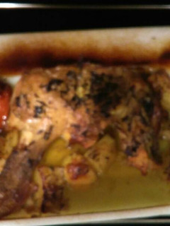 Una foto de Muslo y contra muslo de pollo al horno