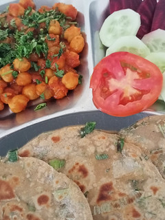 A picture of Chole with Spring onions Paratha.