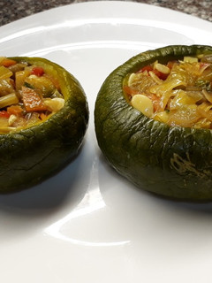 Una foto de Zapallitos rellenos de verdura