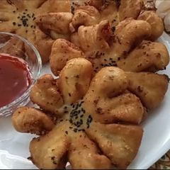 A picture of Potato flowers (tea time snack).