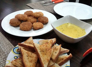 Una foto de Nuggets de Pollo con Salsa de Queso