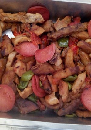 A picture of Pork and salami mixed grill.