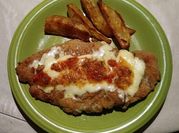 Una foto de supremas de pollo con tomate
