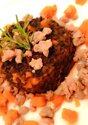 Foto di Riso venere con zucca e salsiccia