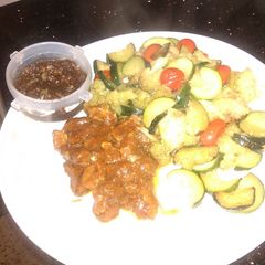 A picture of # local ingredients: beef,courgette,cherry tomatoes  couliflower and brown paste.