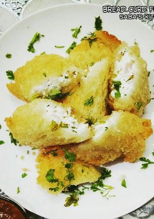 A picture of Bread Hung Curd Heat Roll/Dahi Ke Sholey.