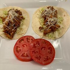 A picture of Chicken Tinga Tacos.
