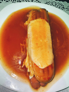 Foto de Cachorro com molho de Francesinha