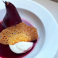 Elderberry and thyme poached pear A picture of Elderberry and thyme poached pear.