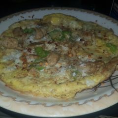 A picture of Cheese chicken omlete.