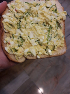 A picture of Imitation of eggs canape- deviled eggs on bread.
