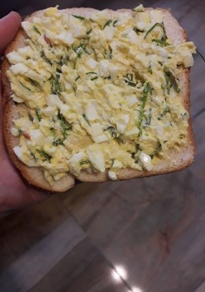 A picture of Imitation of eggs canape- deviled eggs on bread.